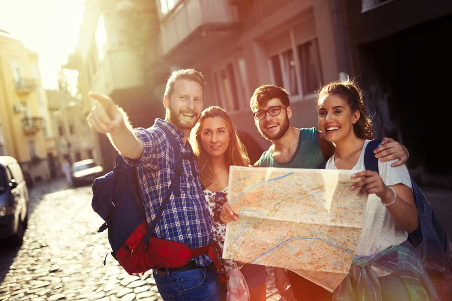 Travel agent welcoming returning clients