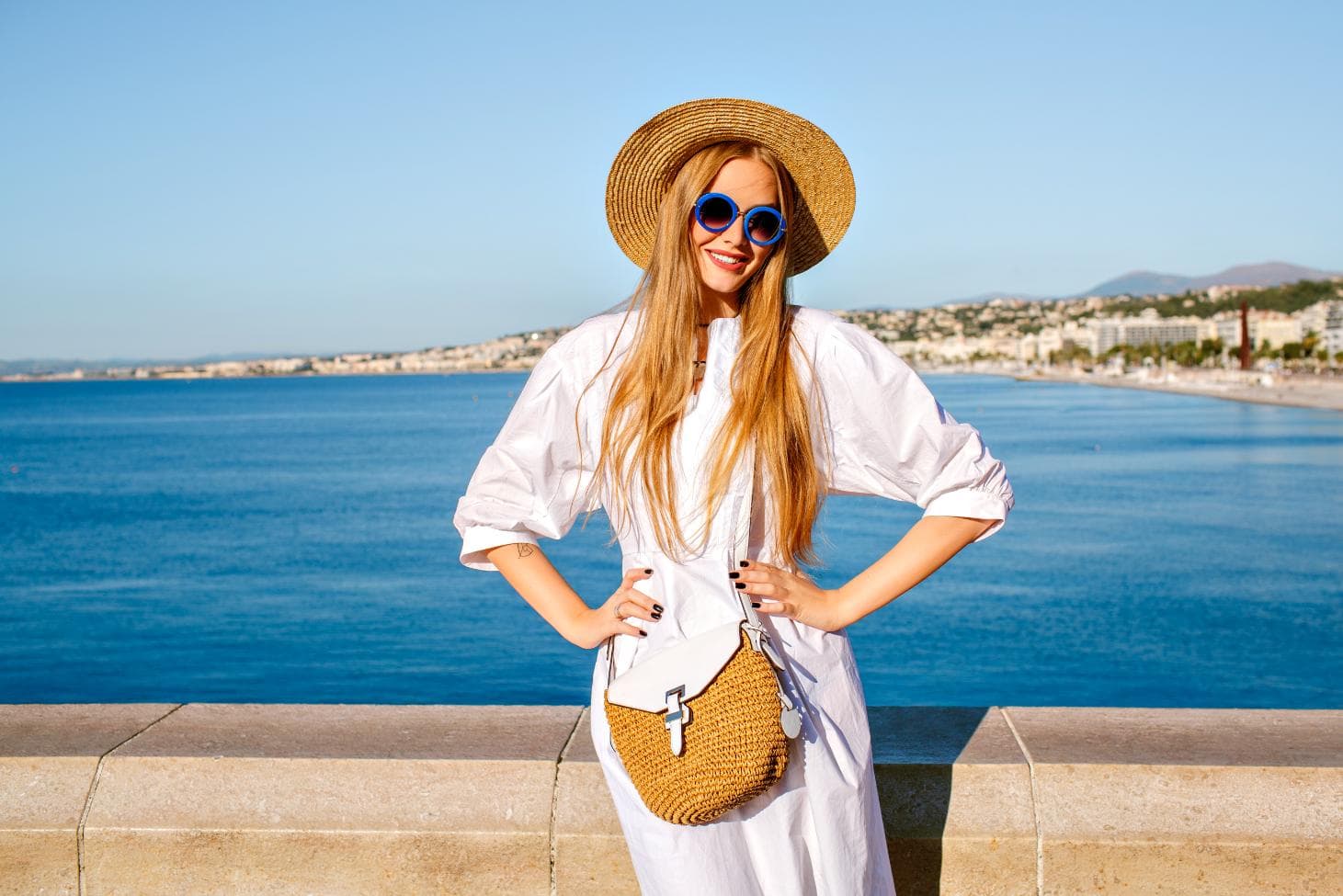 Travel creator capturing content from a scenic clifftop viewpoint