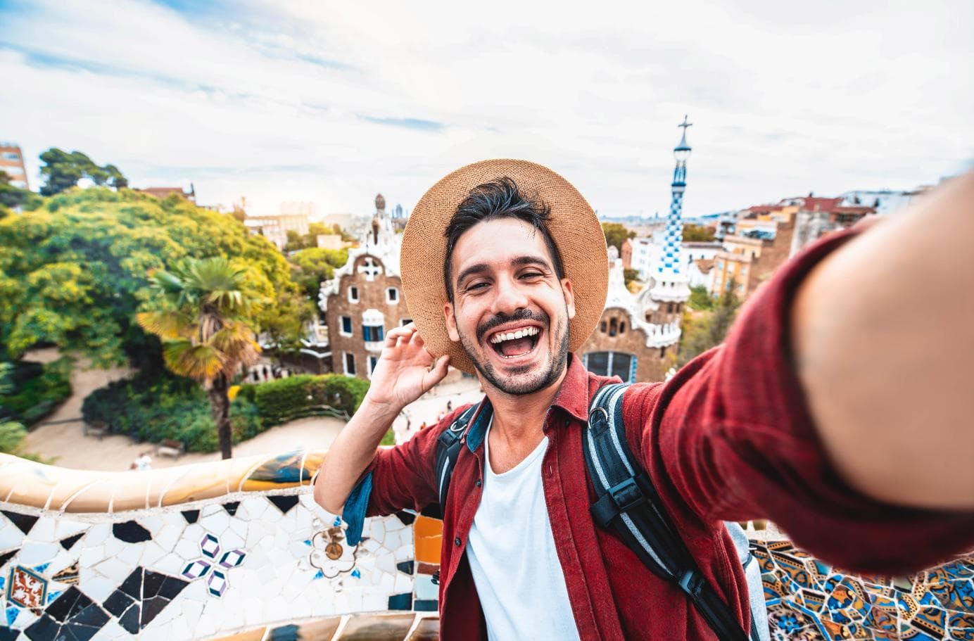 Happy traveller taking a selfie while exploring a holiday destination
